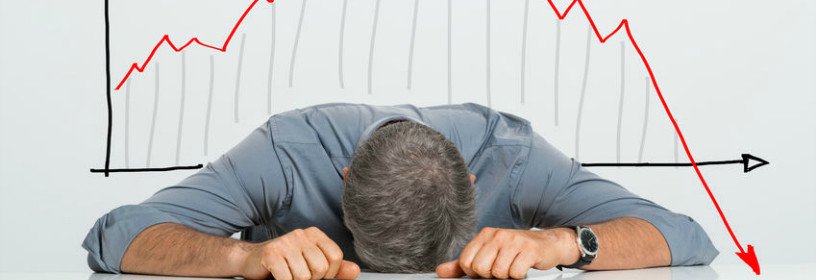 Man laying head on desk