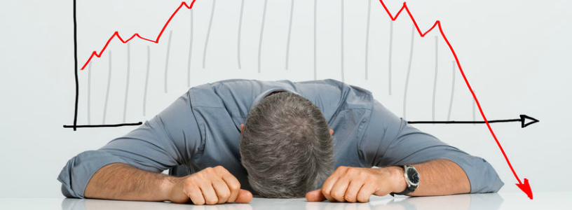 Man laying head on desk