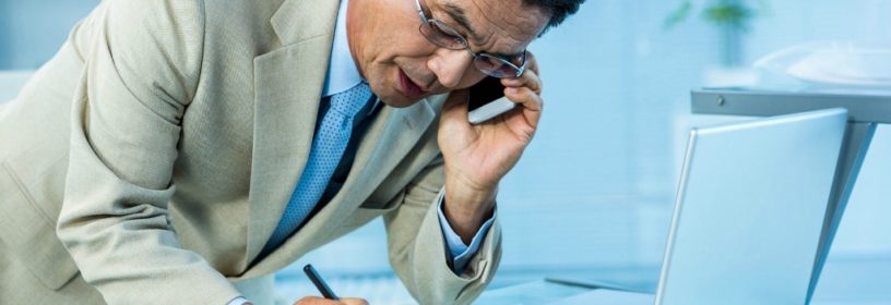 man on phone with risk management attorney