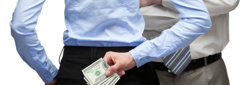 hiding money behind back