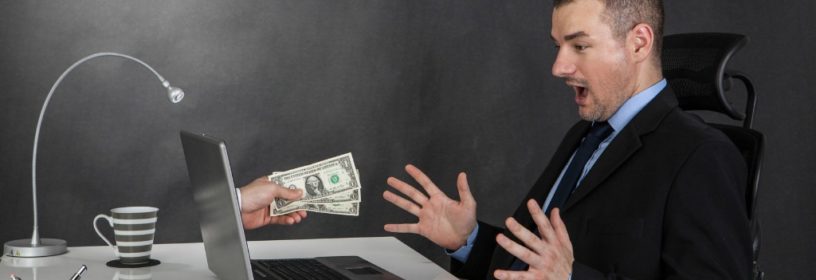 Business man surprised by saving money Real estate E&O insurance