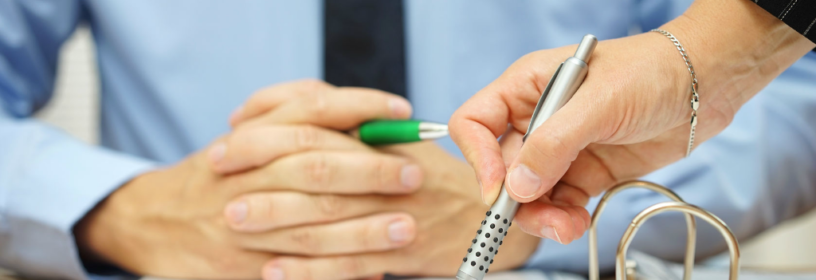 woman reviewing real estate listing marketing to avoid real estate lawsuit
