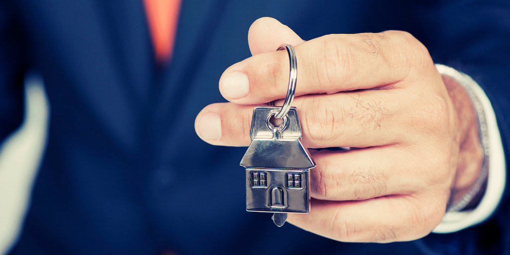 Agent holding keys to agent owned property