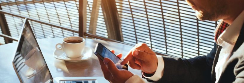 man on email avoids real estate phishing scam