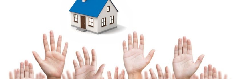 multiple hands raised reaching for house