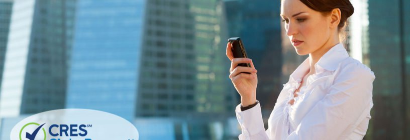 business woman using smartphone urban background