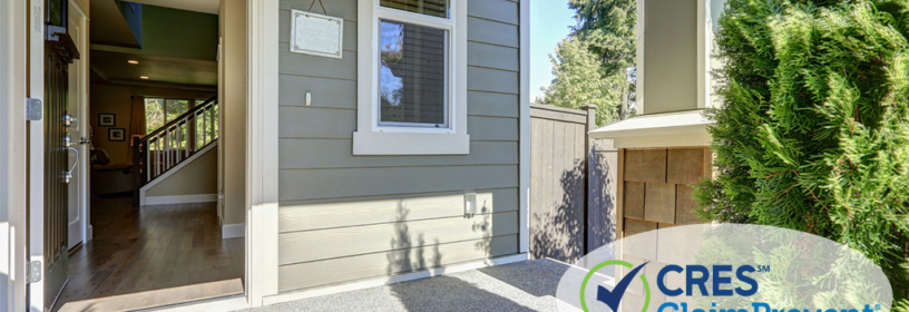 front door with welcome mat and door open