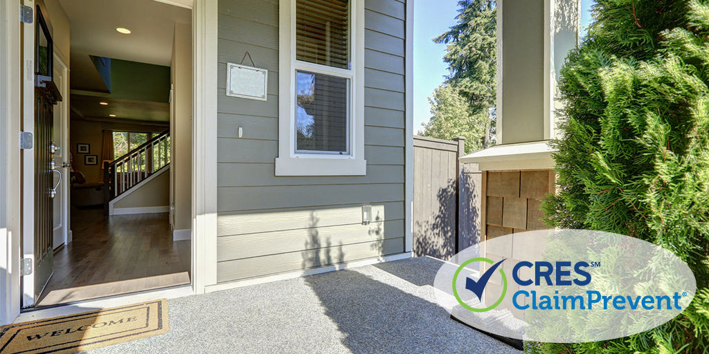 front door with welcome mat and door open