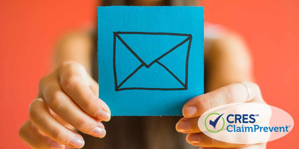 woman holding post-it note with envelope icon representing email marketing