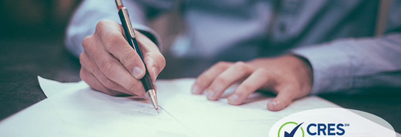 real estate agent writing contract