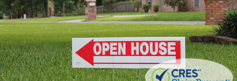 open house sign in front of house