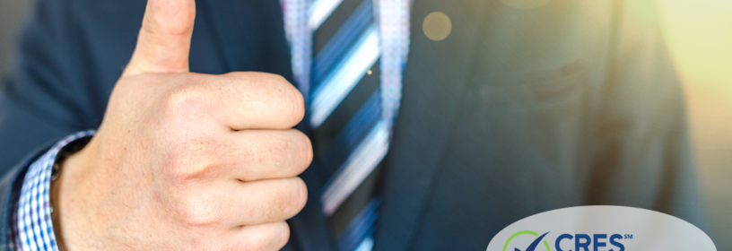 male real estate agent giving thumbs up