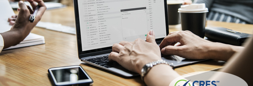woman on computer typing email