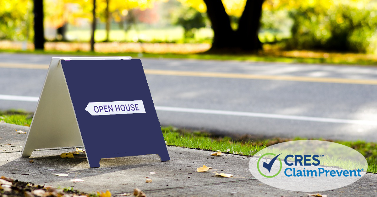 open house sign on sidewalk