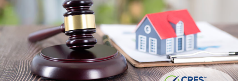gavel and concept house on clipboard