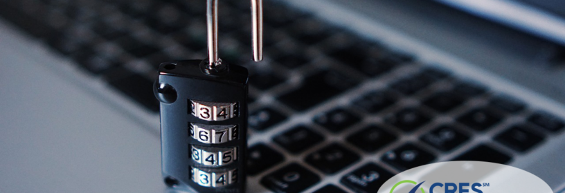 laptop with padlock on keyboard