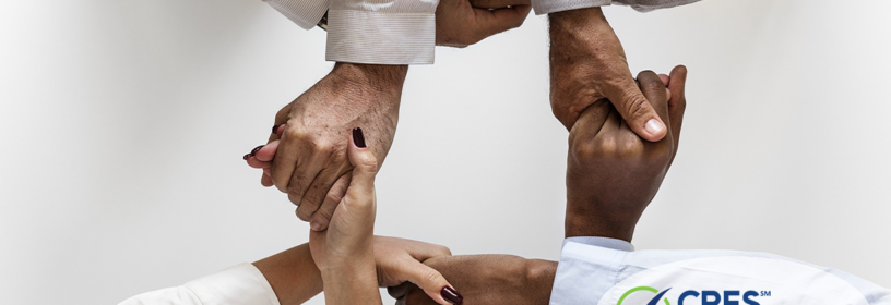 team interlocking hands