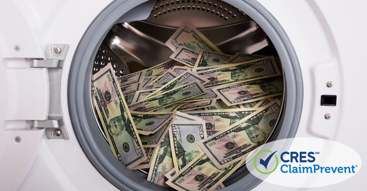 White washer with door open filled with a pile of American $50 bills