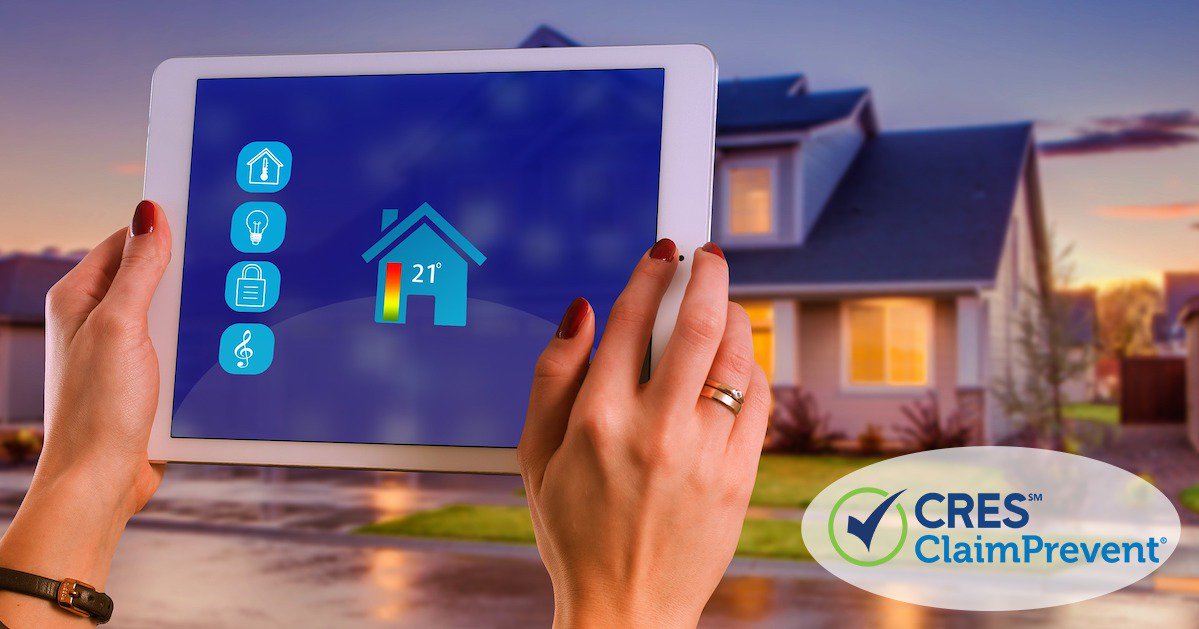 woman holding ipad up in front of house with smart home icons