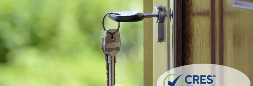 Front door with key in lock