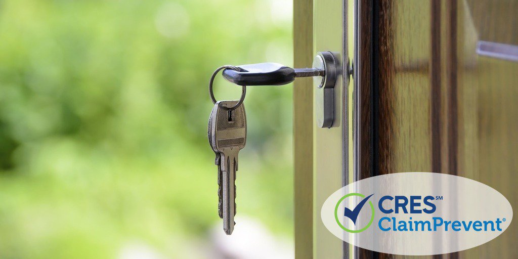 Front door with key in lock