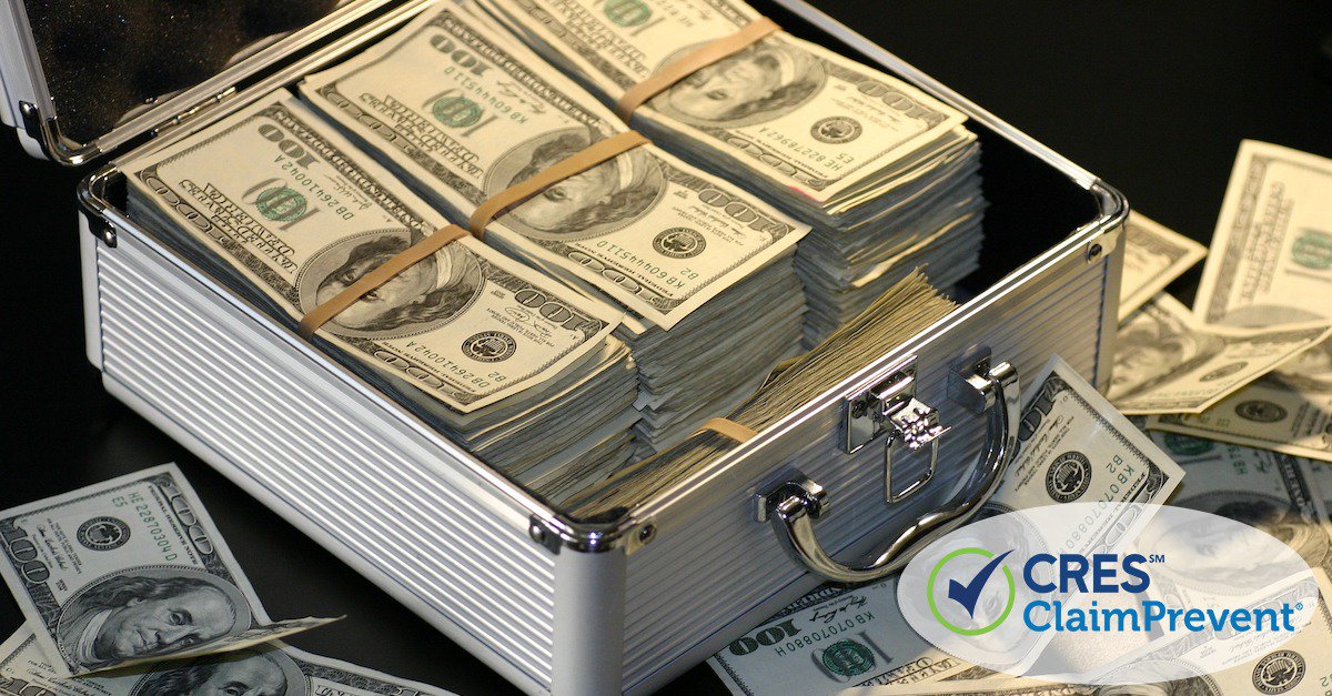 briefcase full of American hundred dollar bills and piles of cash around it