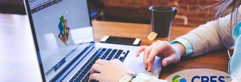 woman typing on laptop