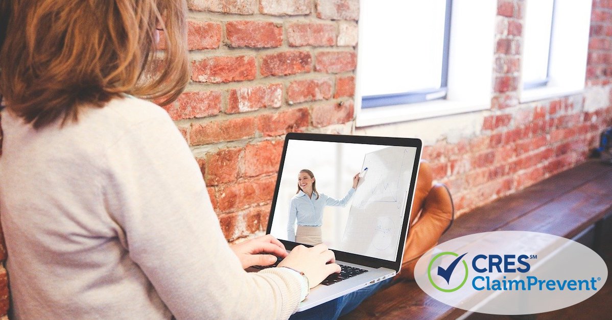 woman on laptop watching a seminar