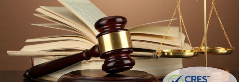 law gavel, books, and scale on desk