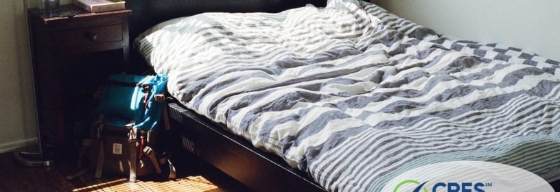 vacant bedroom with backpack