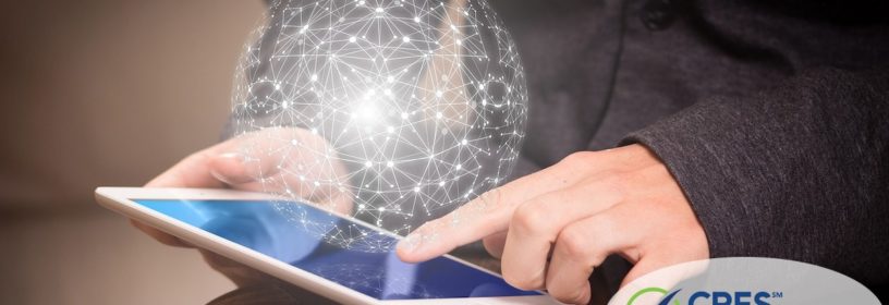 man touching ipad with world simulation image above it