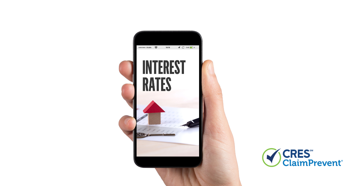 interest rates person holding phone