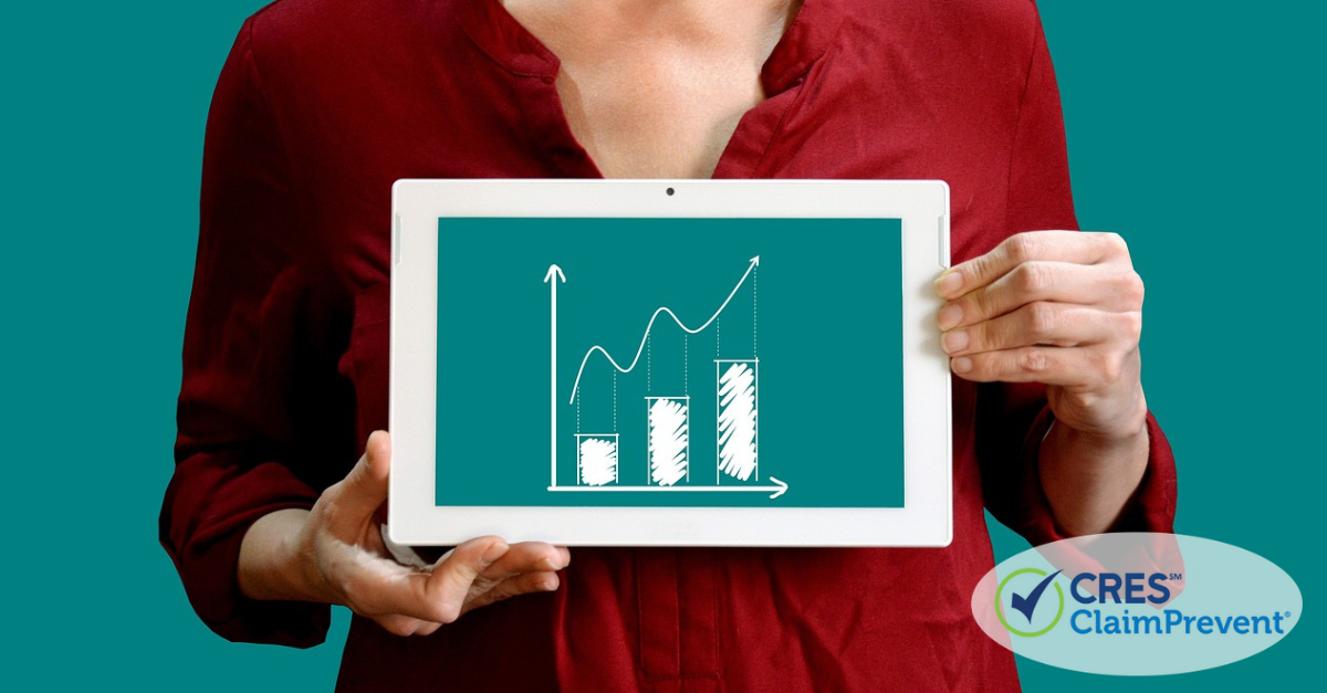 woman holding ipad with chart rising graphic on the screen